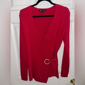 Beautiful red wrap style sweater with bling detail